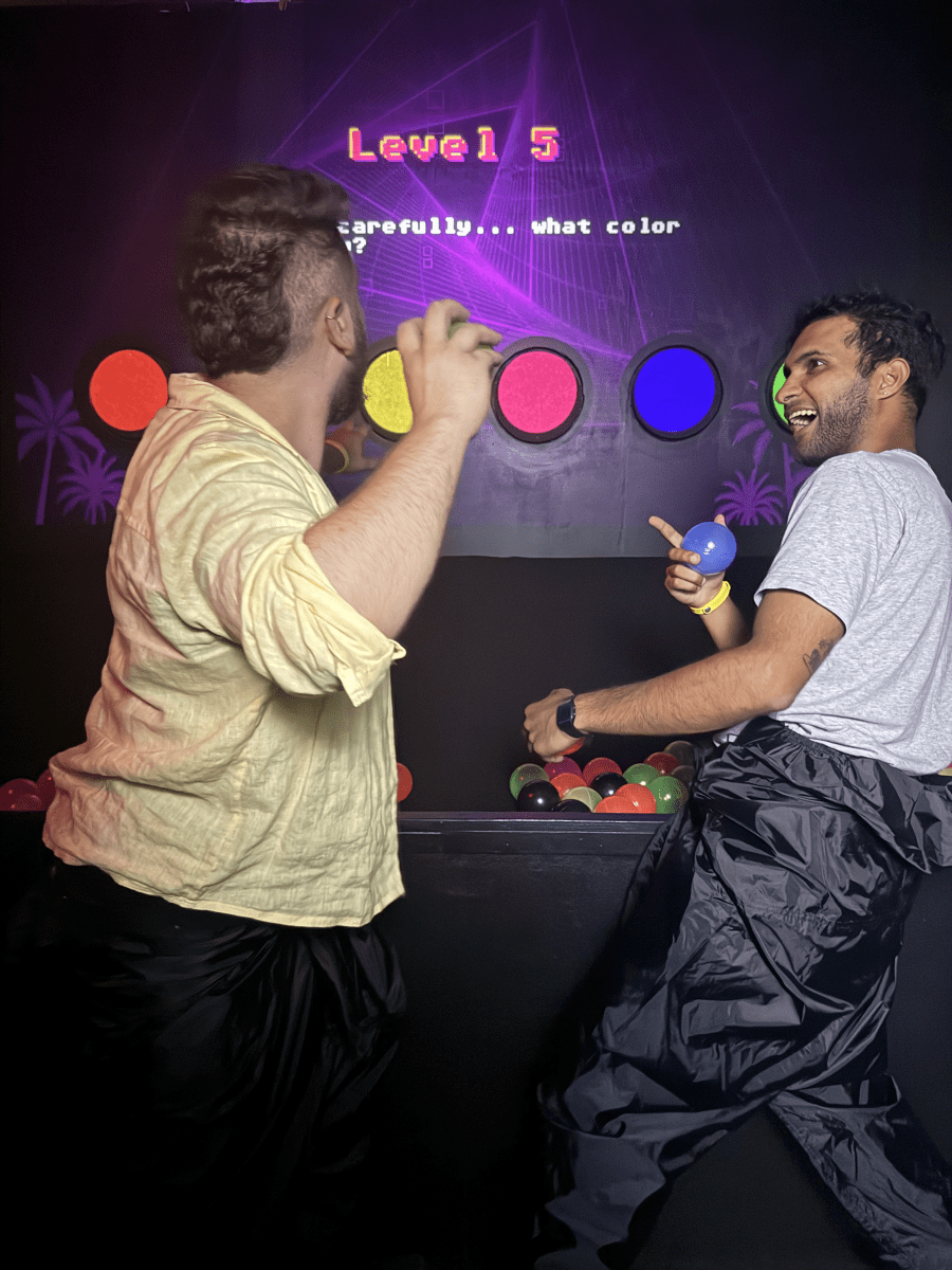 People in a room jumping and having fun
