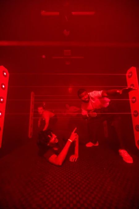 Players playing in the laser room